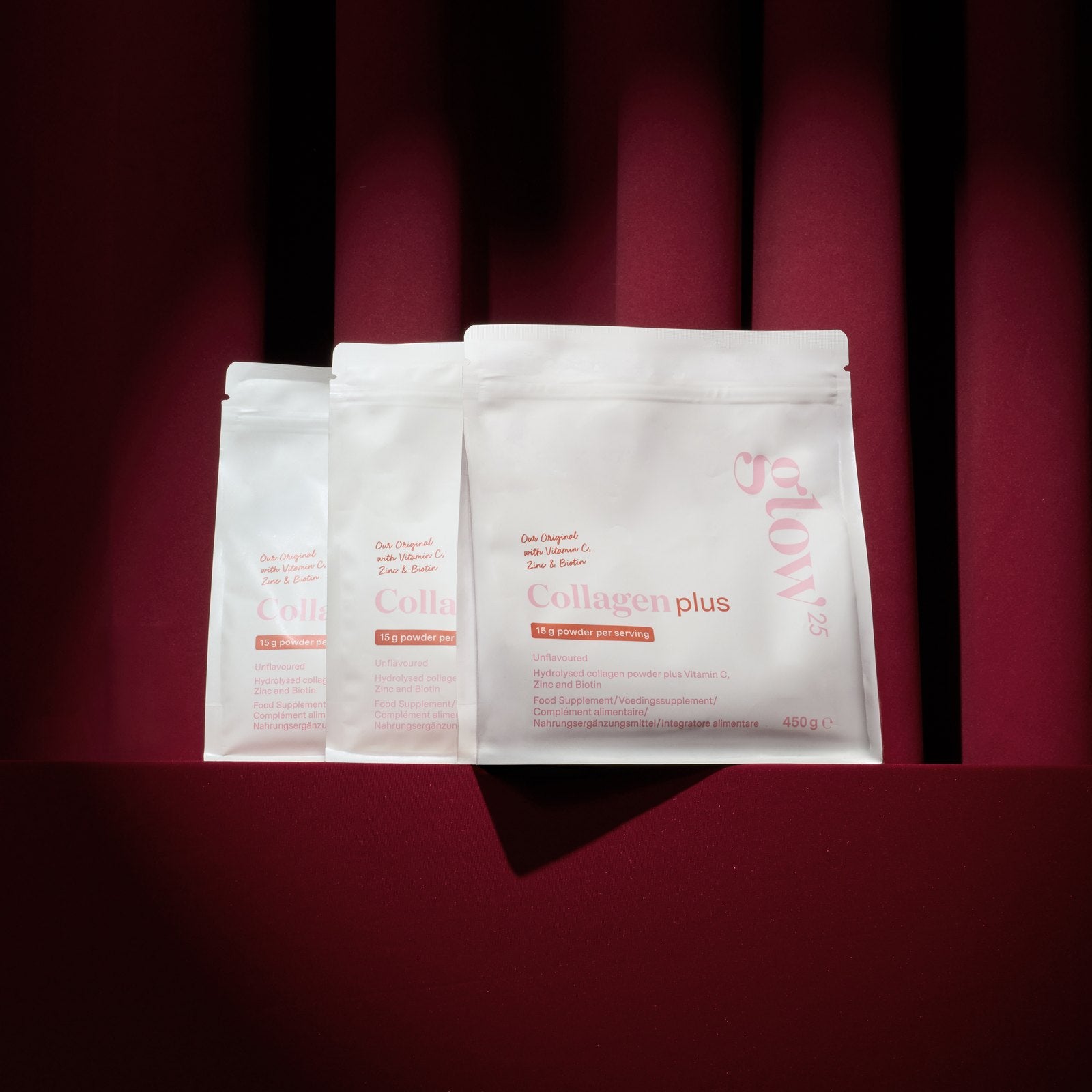 Glow25 Collagen Powder, Collagen Plus, Plus Strawberry and Plus Lemon on the red stage at Glow® Cinema